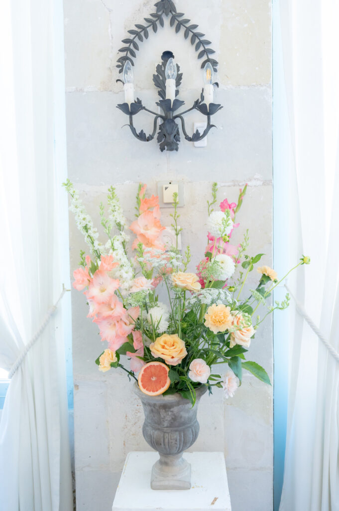 Photographe de mariage : sublimer les détails avec un bouquet de fleurs